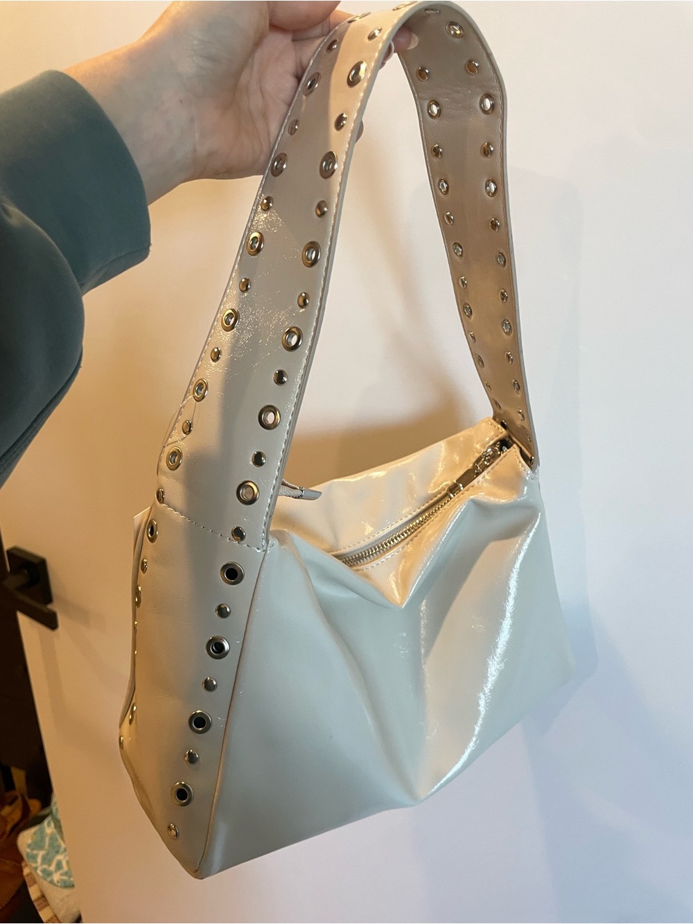 Sleek Ivory Patent Shoulder Bag with Studded Strap